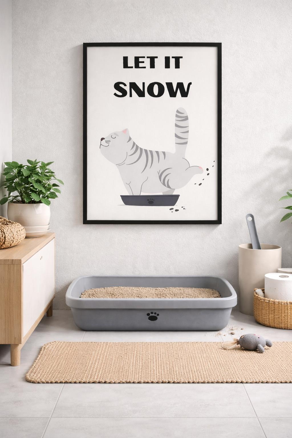 Kedi kumu kabı ve temizlik küreği ile birlikte sergilenen eğlenceli kedi figürlü modern tablo dekorasyonu.