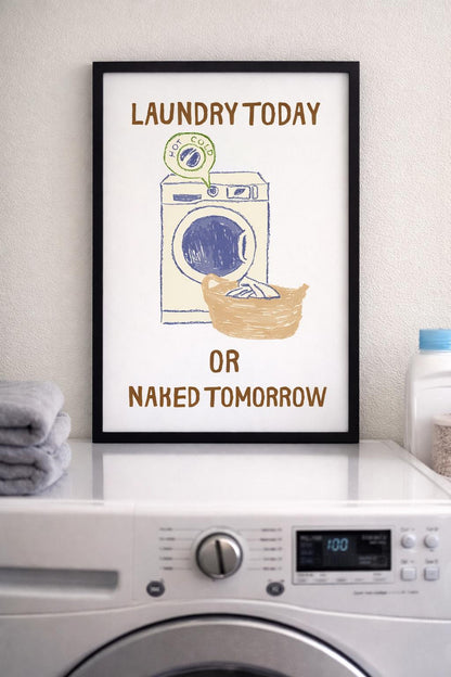 Çamaşır makinesi üzerinde sergilenen, siyah çerçeveli "Laundry Today or Naked Tomorrow" yazılı eğlenceli tablo.