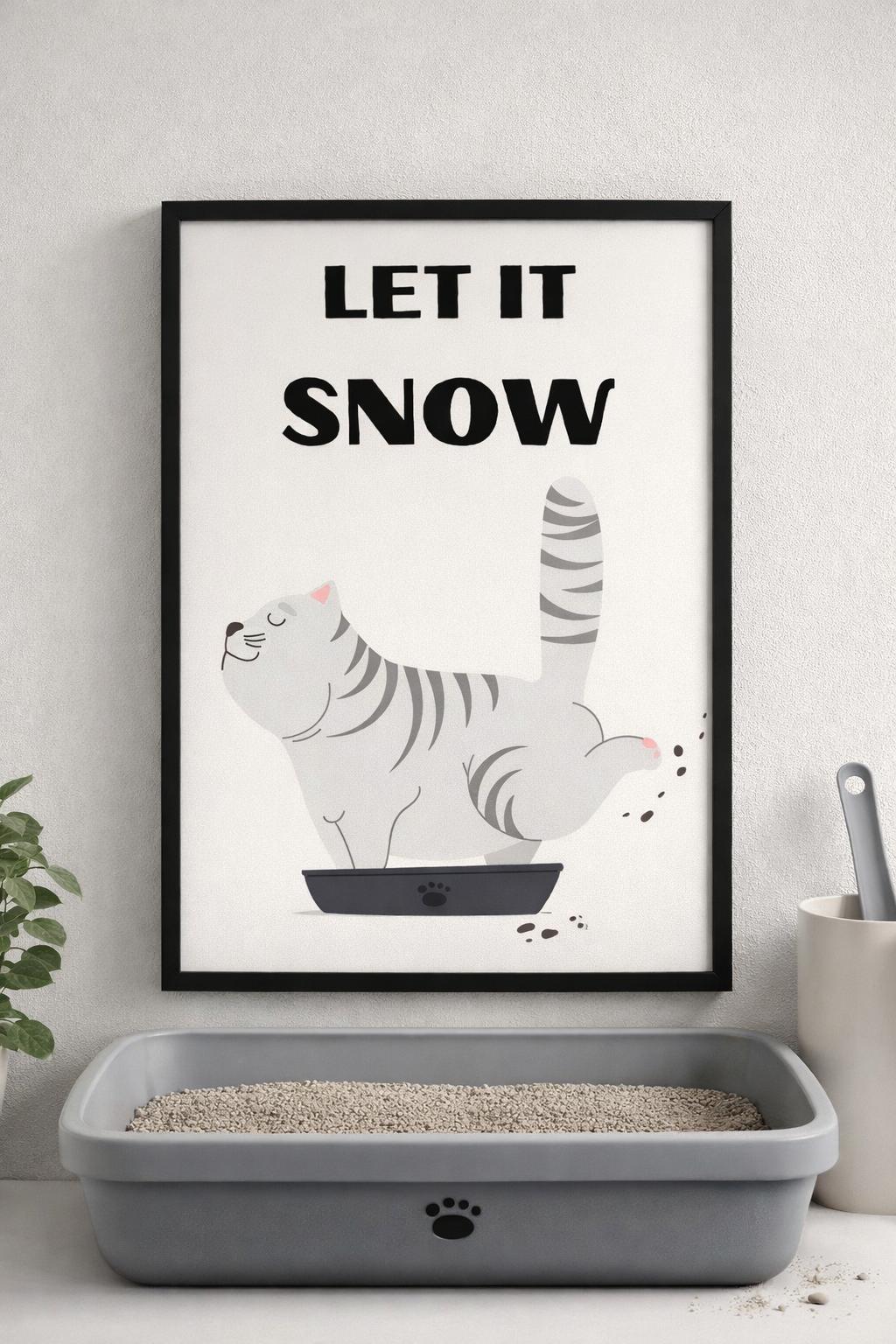 Kedi kumu alanı üzerinde asılı duran, siyah çerçeveli "Let it Snow" yazılı komik kedi tablosu.