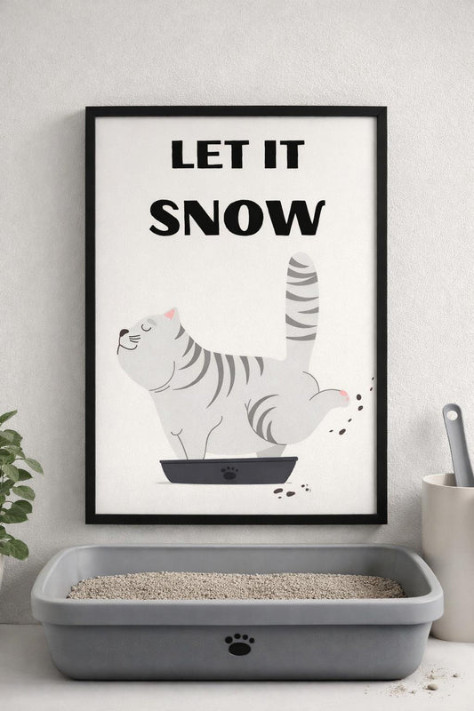 Kedi kumu alanı üzerinde asılı duran, siyah çerçeveli "Let it Snow" yazılı komik kedi tablosu.